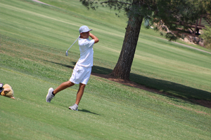 Boy Golf Action Shot